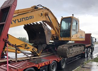 Достоинства транспортировки спецтехники на платформе